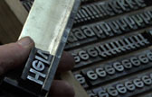 Helvetica letterpress and lower case v